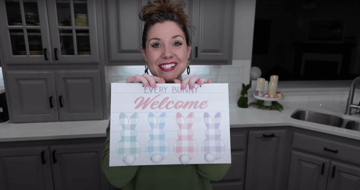 Lindsay holding sign