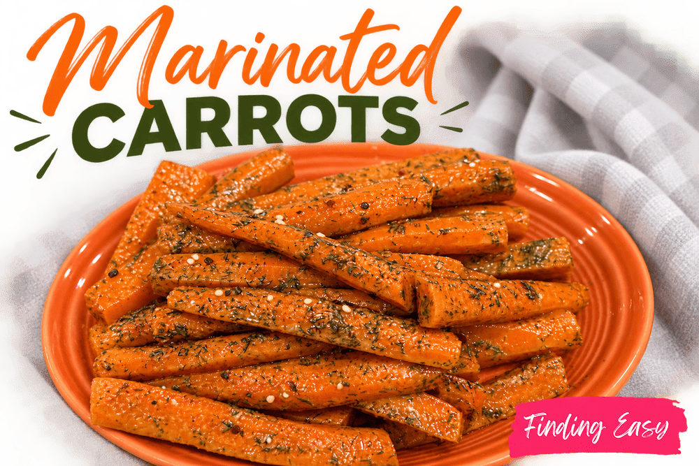 Marinated carrots with dill, chili crisp and sesame seeds served on an orange plate.